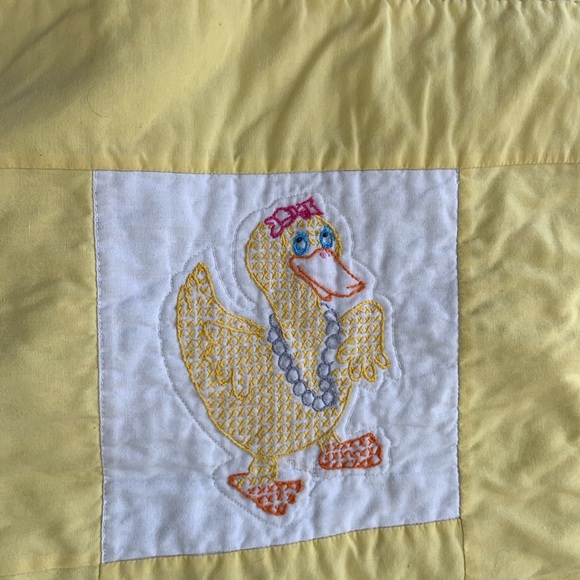 Vintage baby quilt with cross-stitch ducks in many activities. - Picture 3 of 9